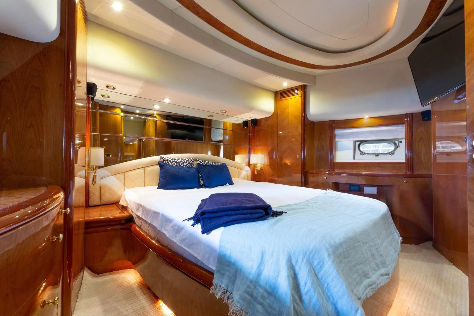 a bedroom with a bed aboard GRAVITY Yacht for Sale