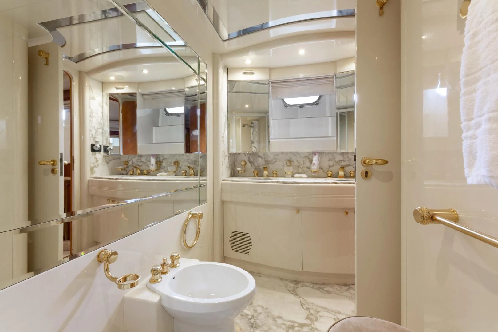 a bathroom with a sink and a mirror aboard GRAVITY Yacht for Sale