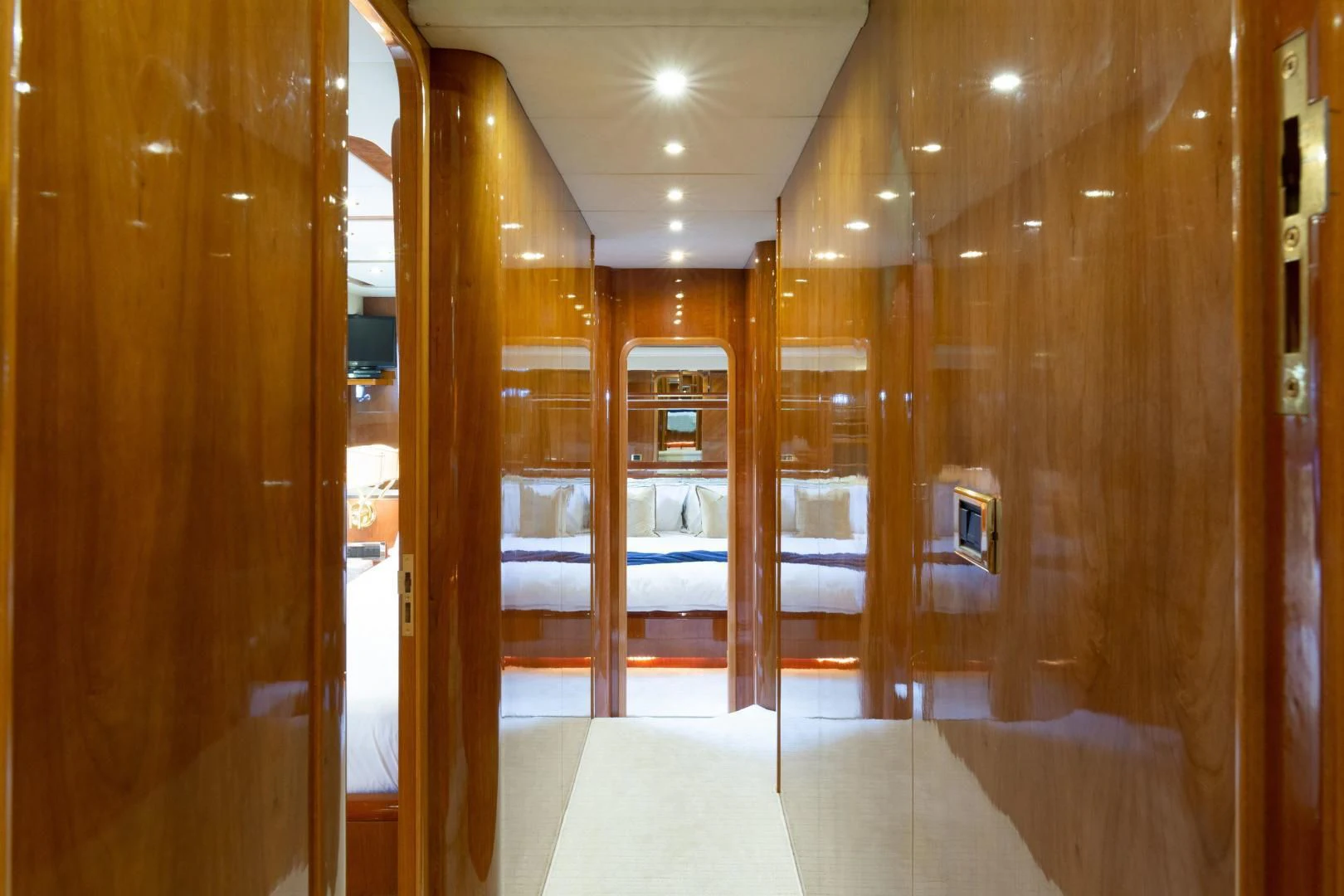 a room with a large mirror aboard GRAVITY Yacht for Sale