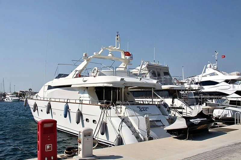 a boat docked at a pier aboard GRAVITY Yacht for Sale