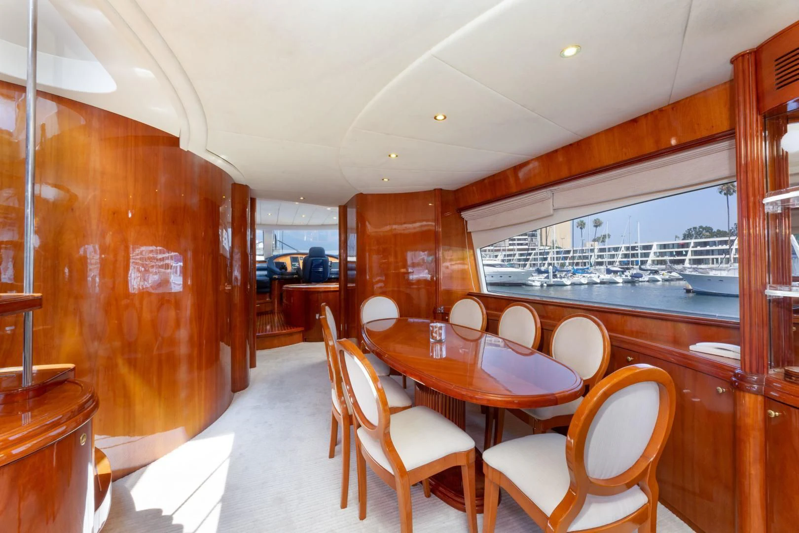 a dining room with wood walls aboard GRAVITY Yacht for Sale