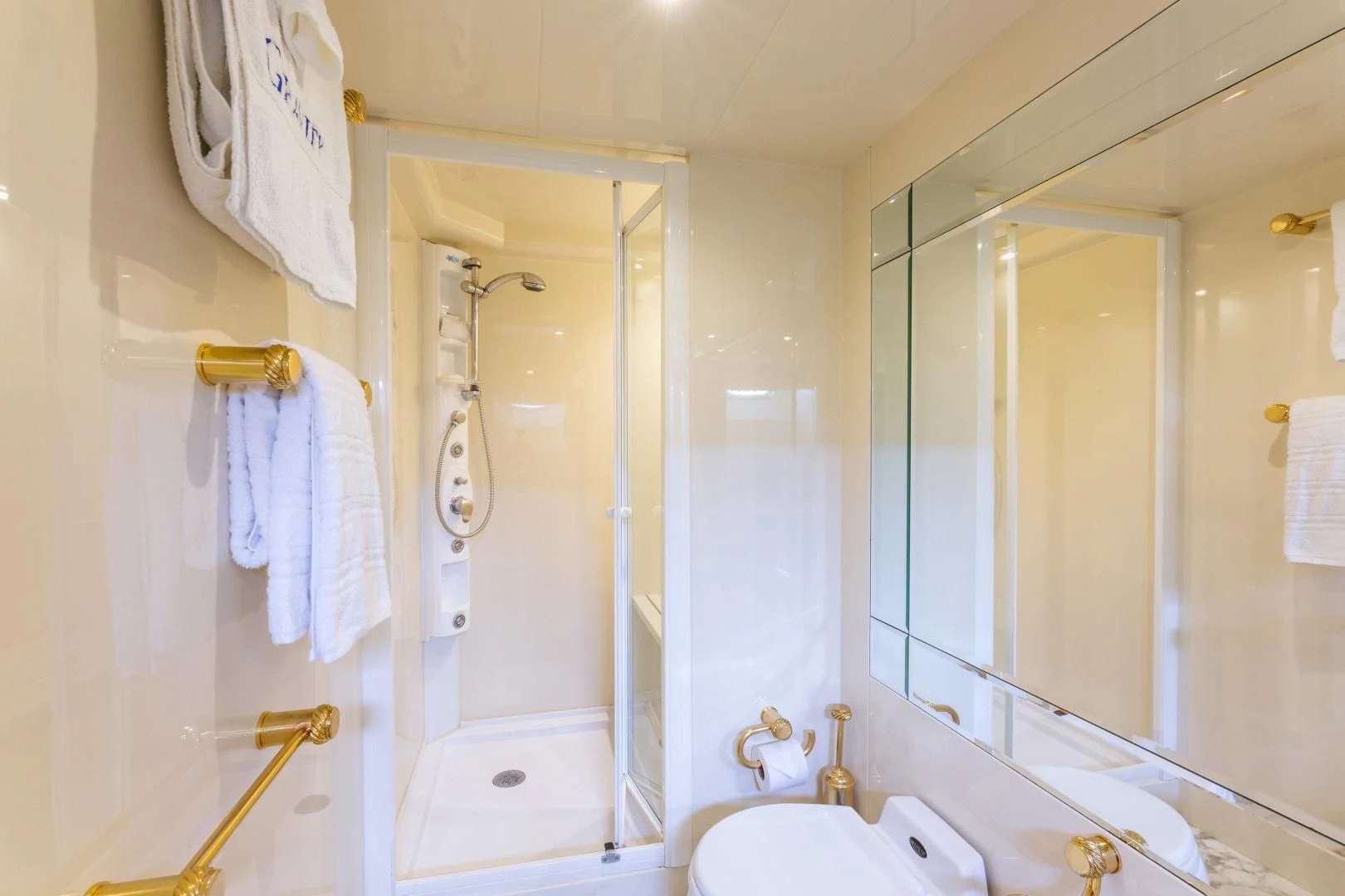 a bathroom with a shower and sink aboard GRAVITY Yacht for Sale