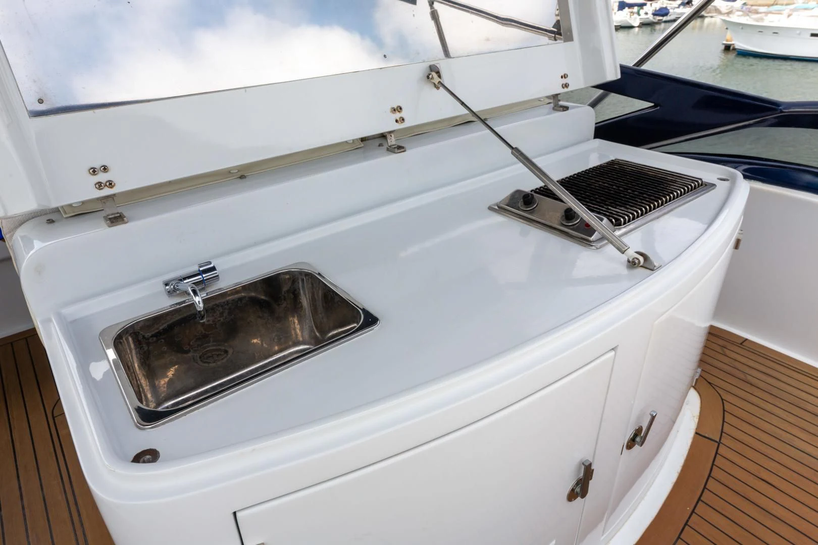 the front of a white car aboard GRAVITY Yacht for Sale