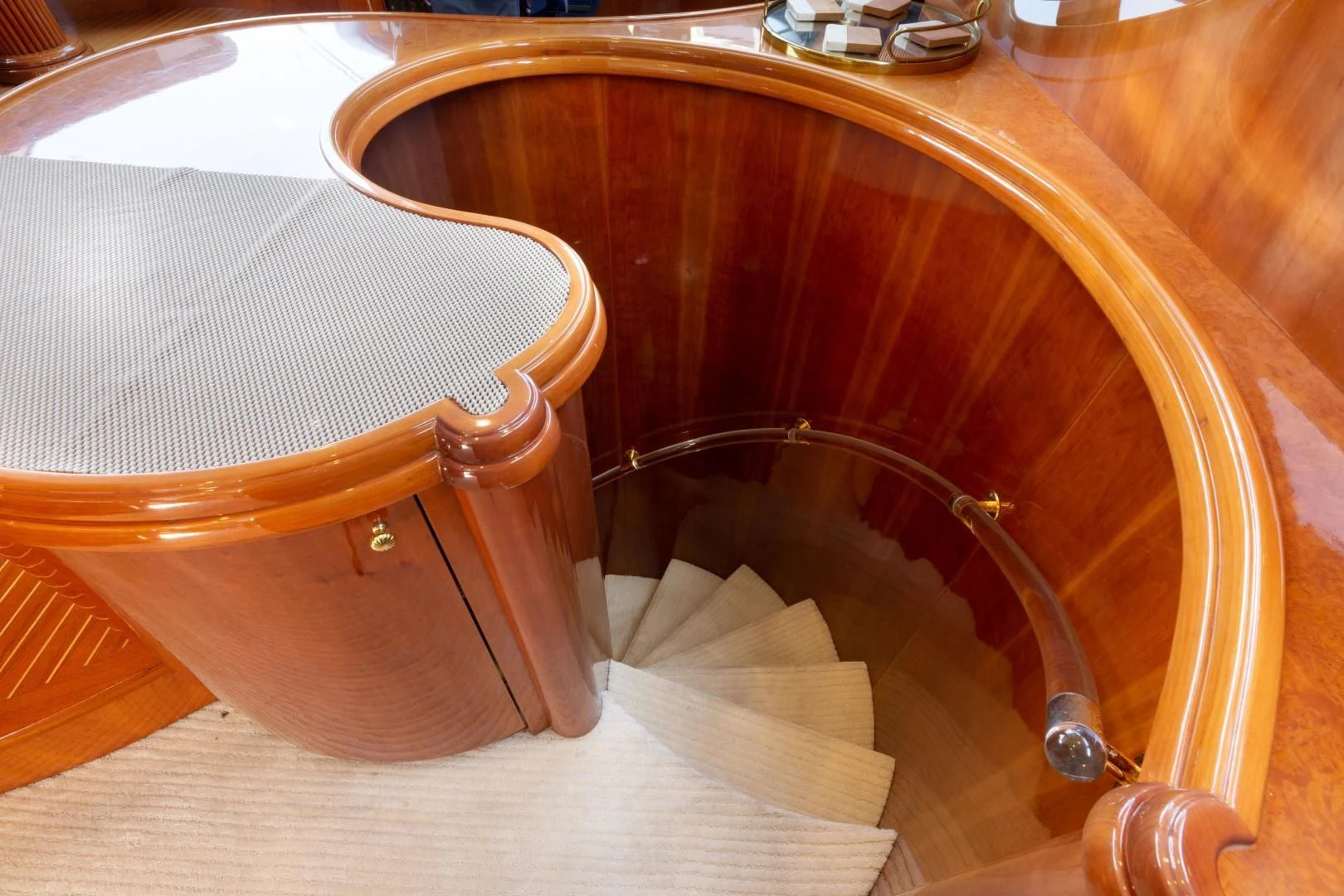 a wooden chair with a seat aboard GRAVITY Yacht for Sale
