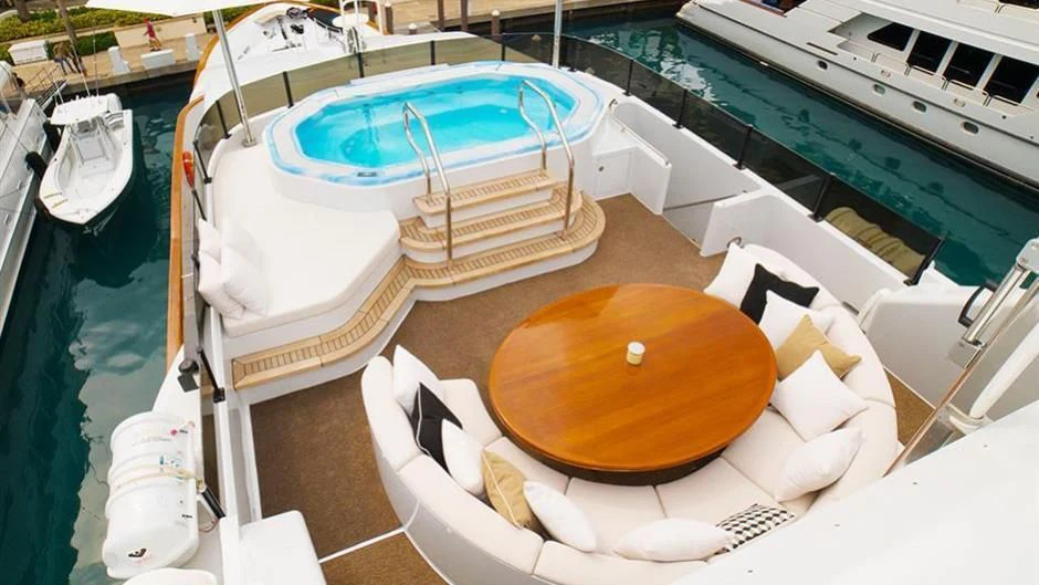 a boat on the water aboard GRAND ILLUSION Yacht for Sale