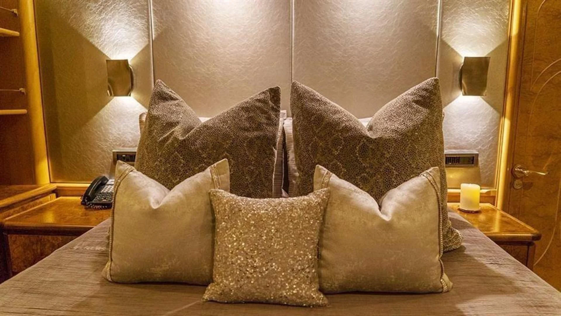 a bed with pillows aboard GRAND ILLUSION Yacht for Sale
