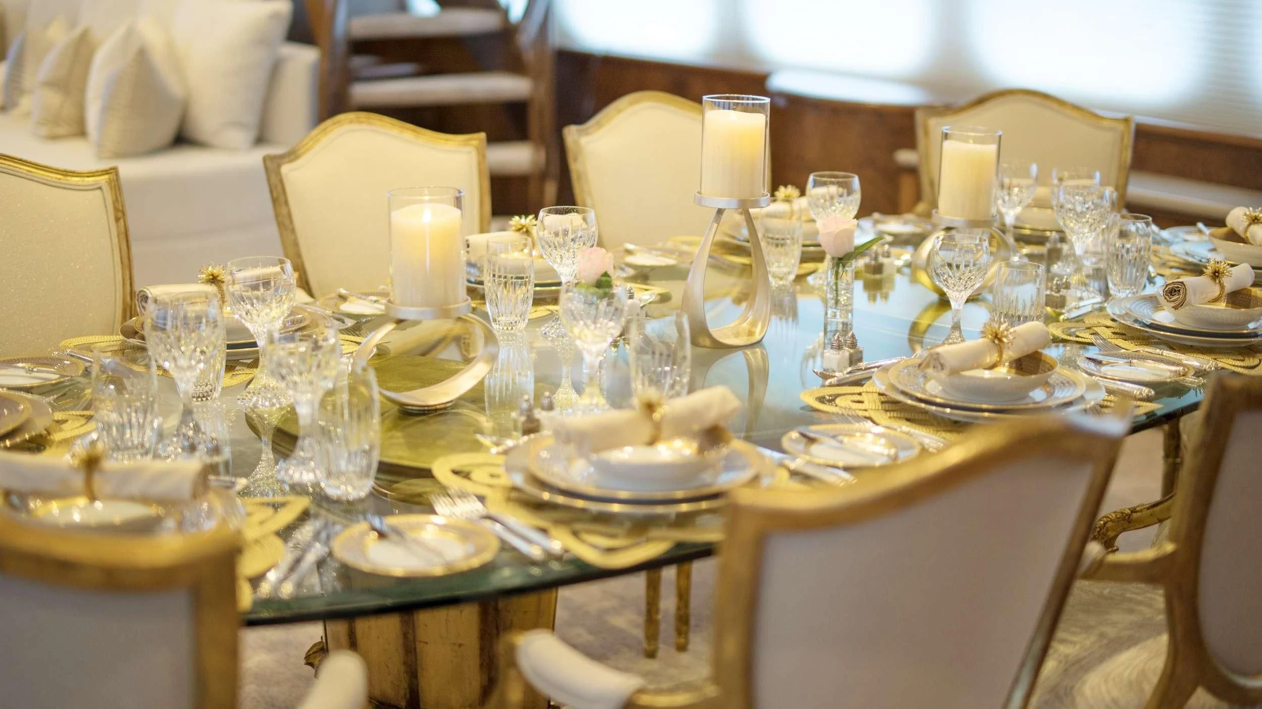 a table set for a dinner aboard GRAND ILLUSION Yacht for Sale