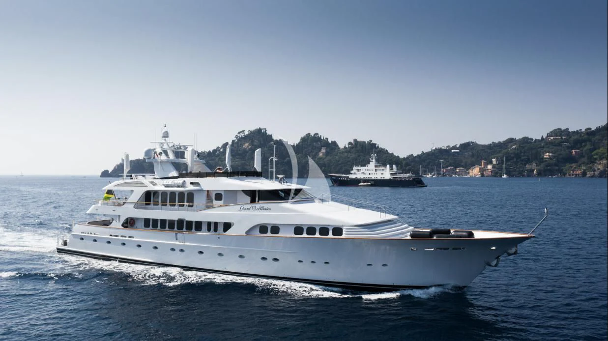a boat on the water aboard GRAND ILLUSION Yacht for Sale