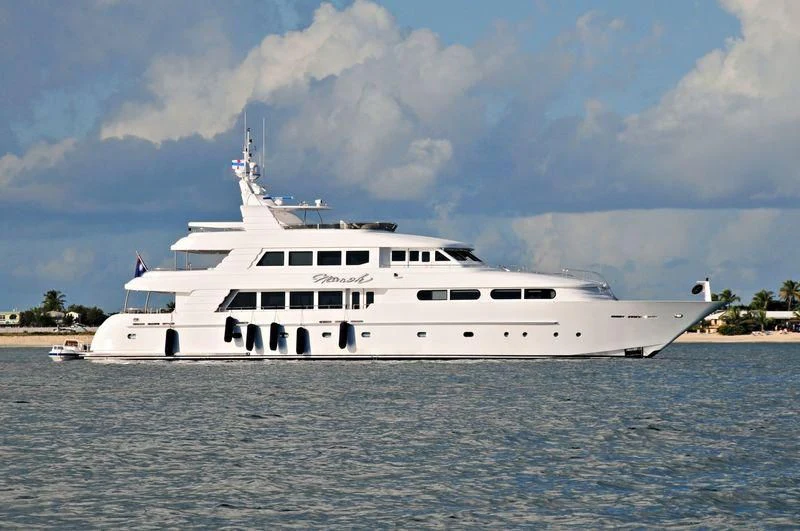 a large white boat in the water aboard CHARLOTTE ANN Yacht for Sale