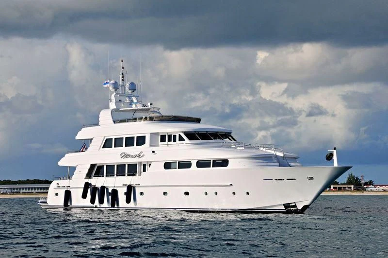 a white yacht in the water aboard CHARLOTTE ANN Yacht for Sale