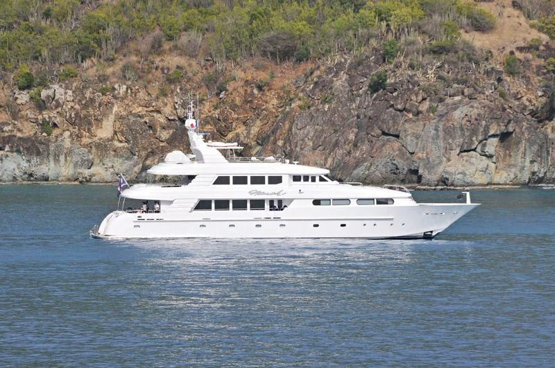 a white yacht in the water aboard CHARLOTTE ANN Yacht for Sale
