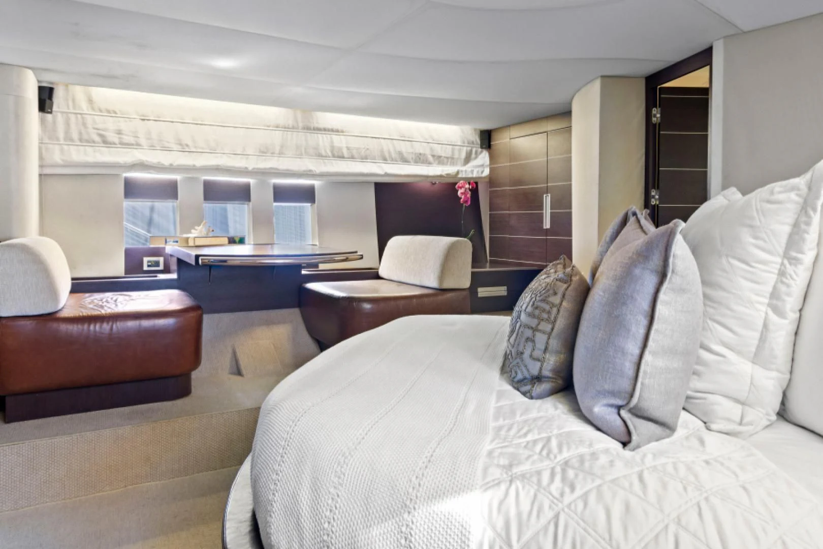 a room with a bed and a table aboard BLIND SQUIRREL Yacht for Sale