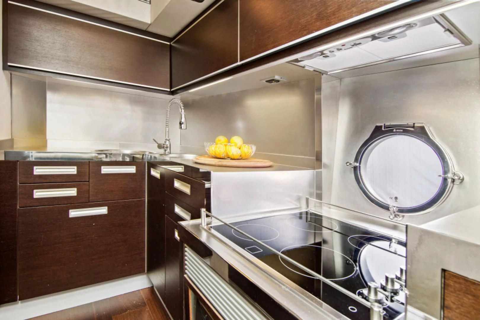a kitchen with a large mirror aboard BLIND SQUIRREL Yacht for Sale