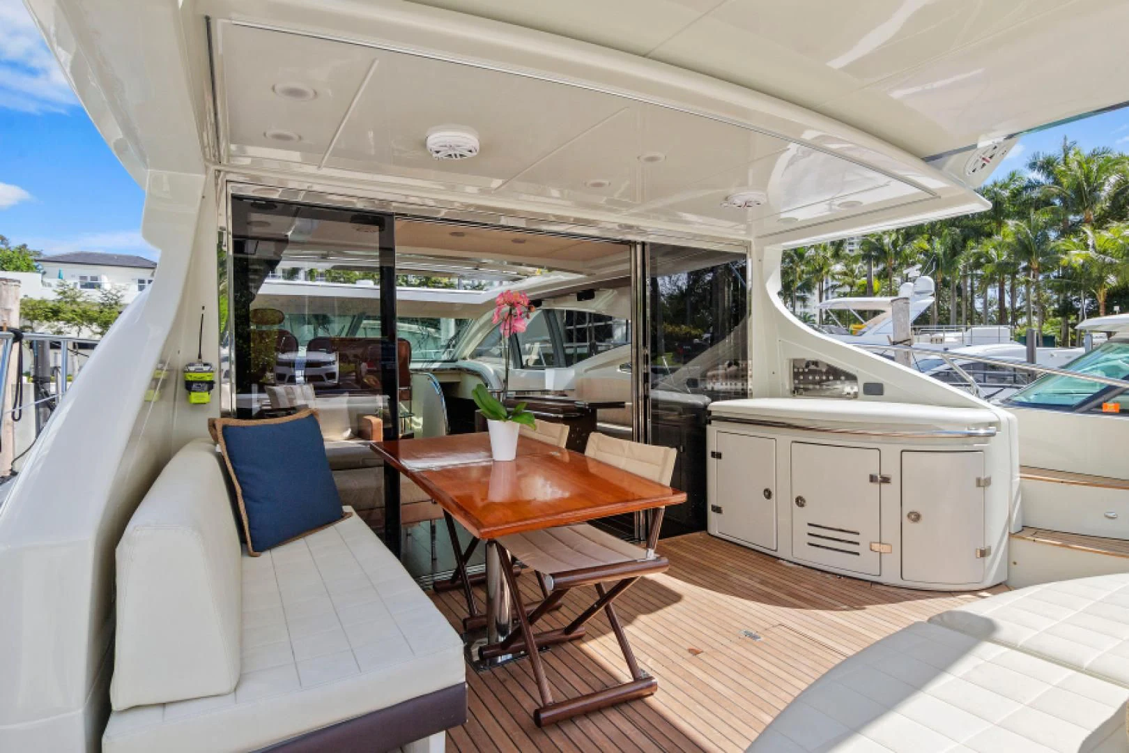 a boat with a table and chairs aboard BLIND SQUIRREL Yacht for Sale
