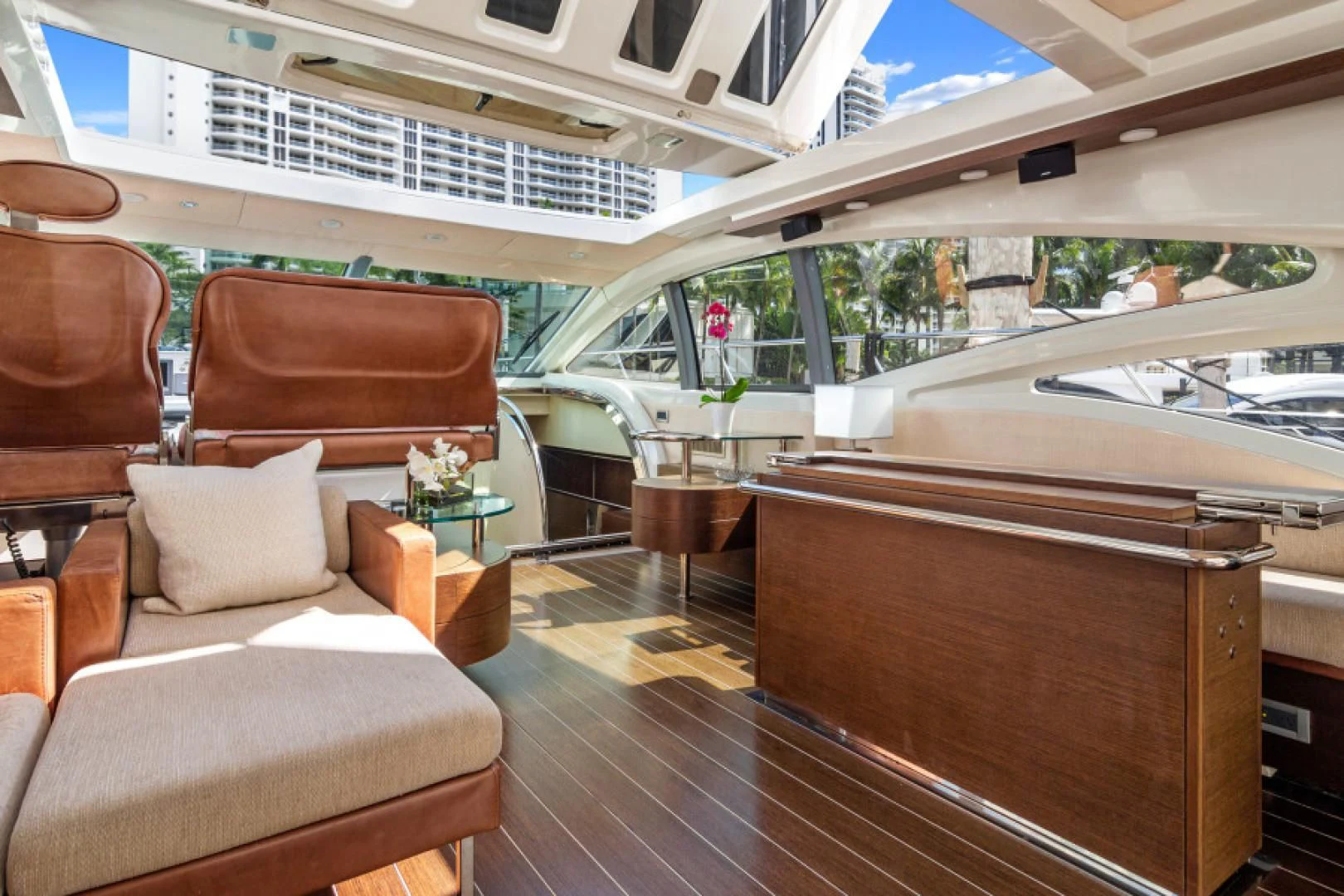 a boat with a table and chairs aboard BLIND SQUIRREL Yacht for Sale