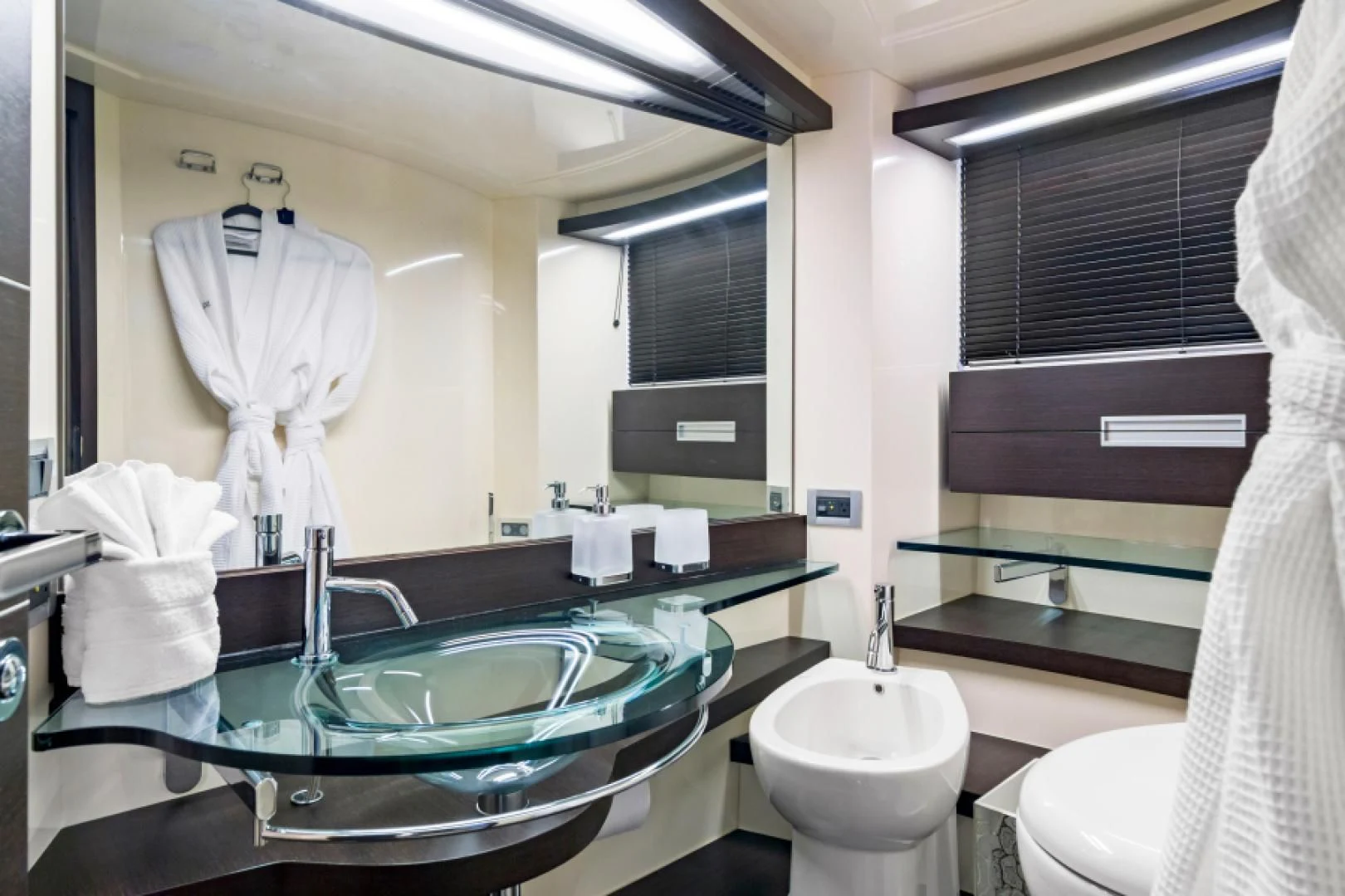 a bathroom with a sink and a mirror aboard BLIND SQUIRREL Yacht for Sale