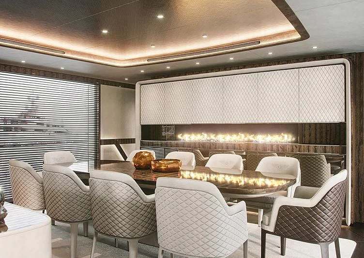 a large room with chairs and a table aboard STEFANIA Yacht for Sale