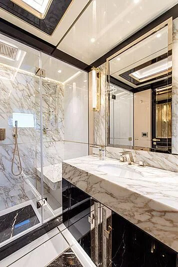 a bathroom with a large mirror aboard STEFANIA Yacht for Sale