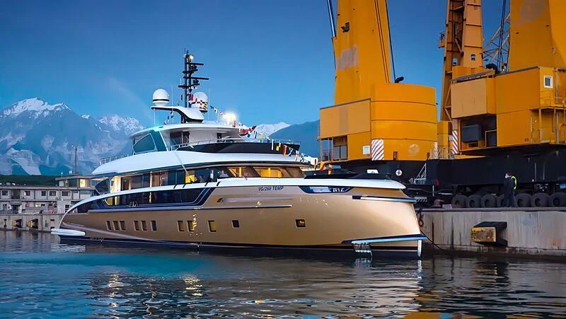 a large white boat in a harbor aboard STEFANIA Yacht for Sale