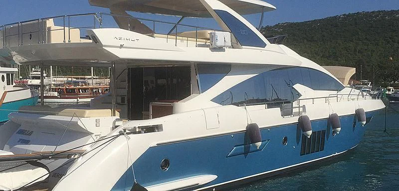 a boat docked at a pier aboard BELLA TWO Yacht for Sale