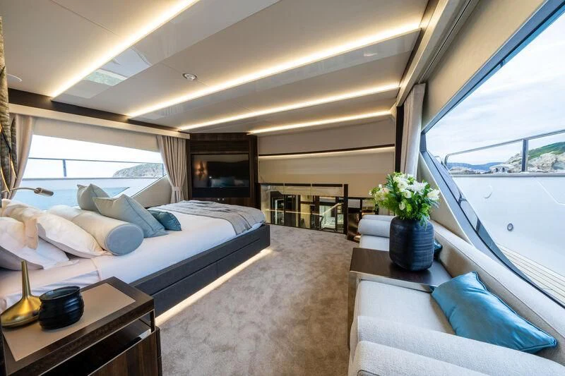 a room with a bed and a window aboard BLUE INFINITY ONE Yacht for Sale