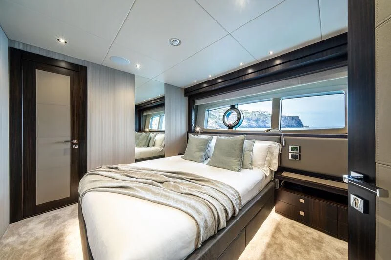 a bedroom with a bed aboard BLUE INFINITY ONE Yacht for Sale