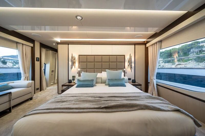 a large bed in a room aboard BLUE INFINITY ONE Yacht for Sale
