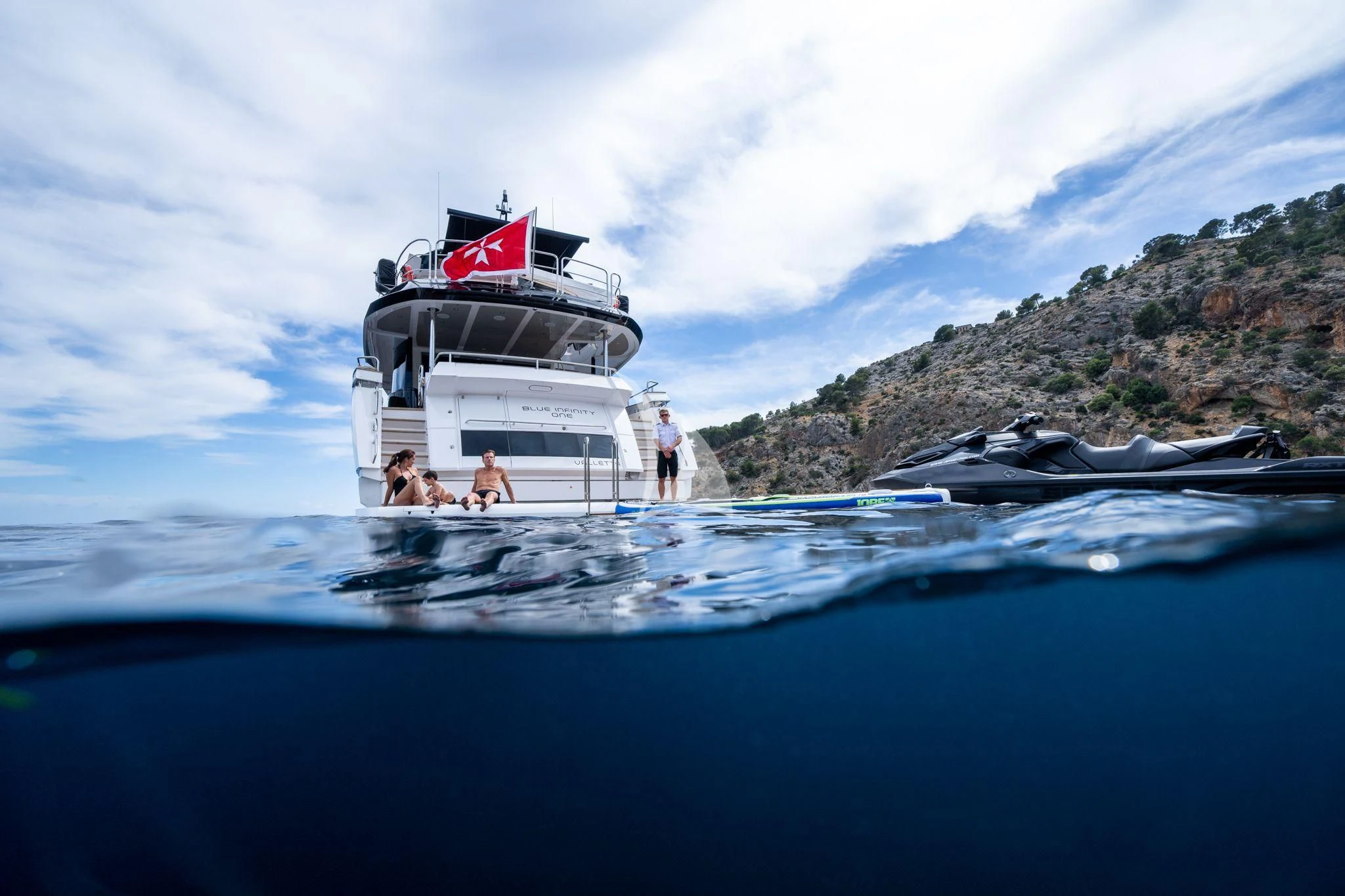 a boat with people on it aboard BLUE INFINITY ONE Yacht for Sale