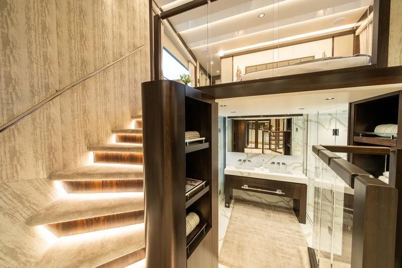 a wooden staircase in a room aboard BLUE INFINITY ONE Yacht for Sale
