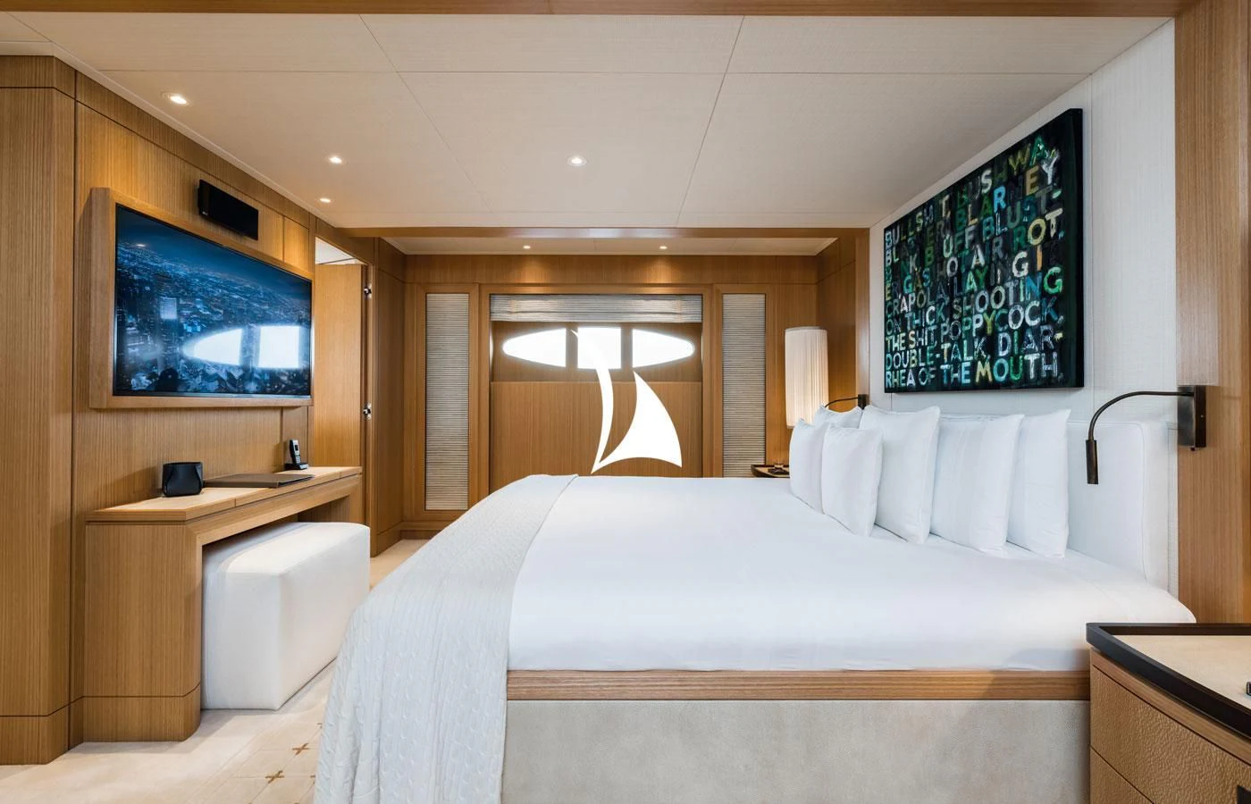 a bedroom with a large bed aboard VENTUM MARIS Yacht for Charter