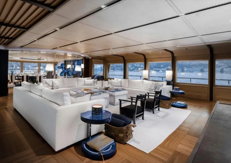 a room with a couch and a table aboard VENTUM MARIS Yacht for Charter