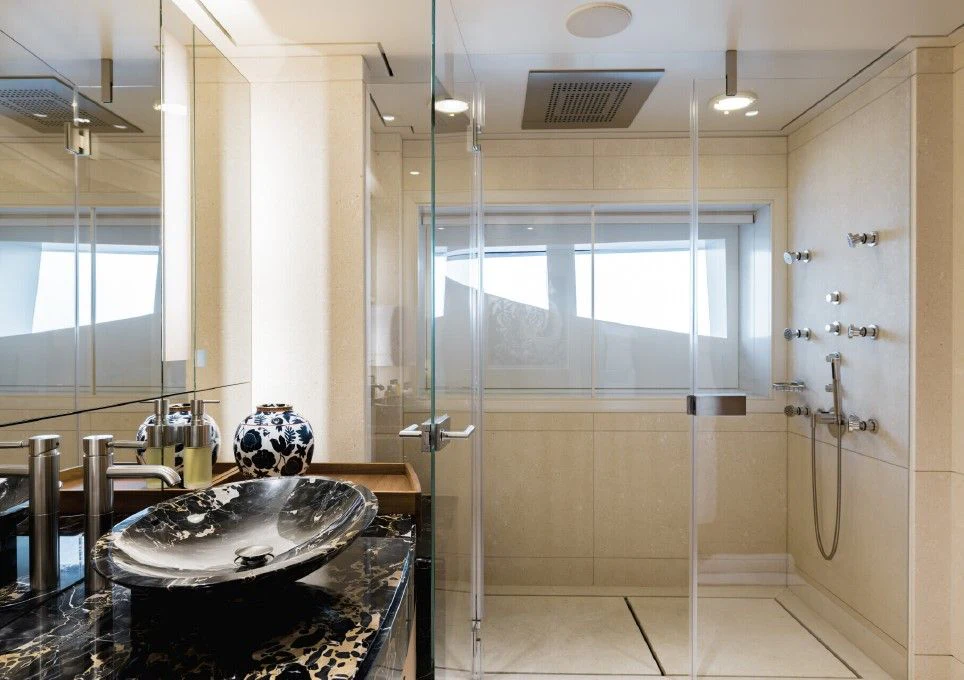 a bathroom with a sink and shower aboard VENTUM MARIS Yacht for Charter