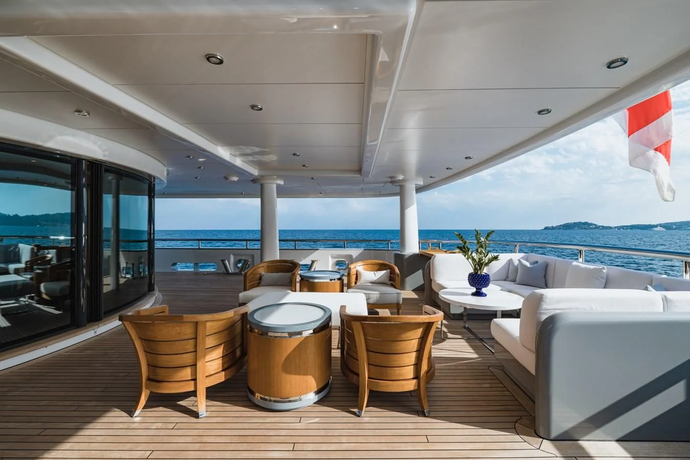 a room with a table and chairs aboard VENTUM MARIS Yacht for Charter