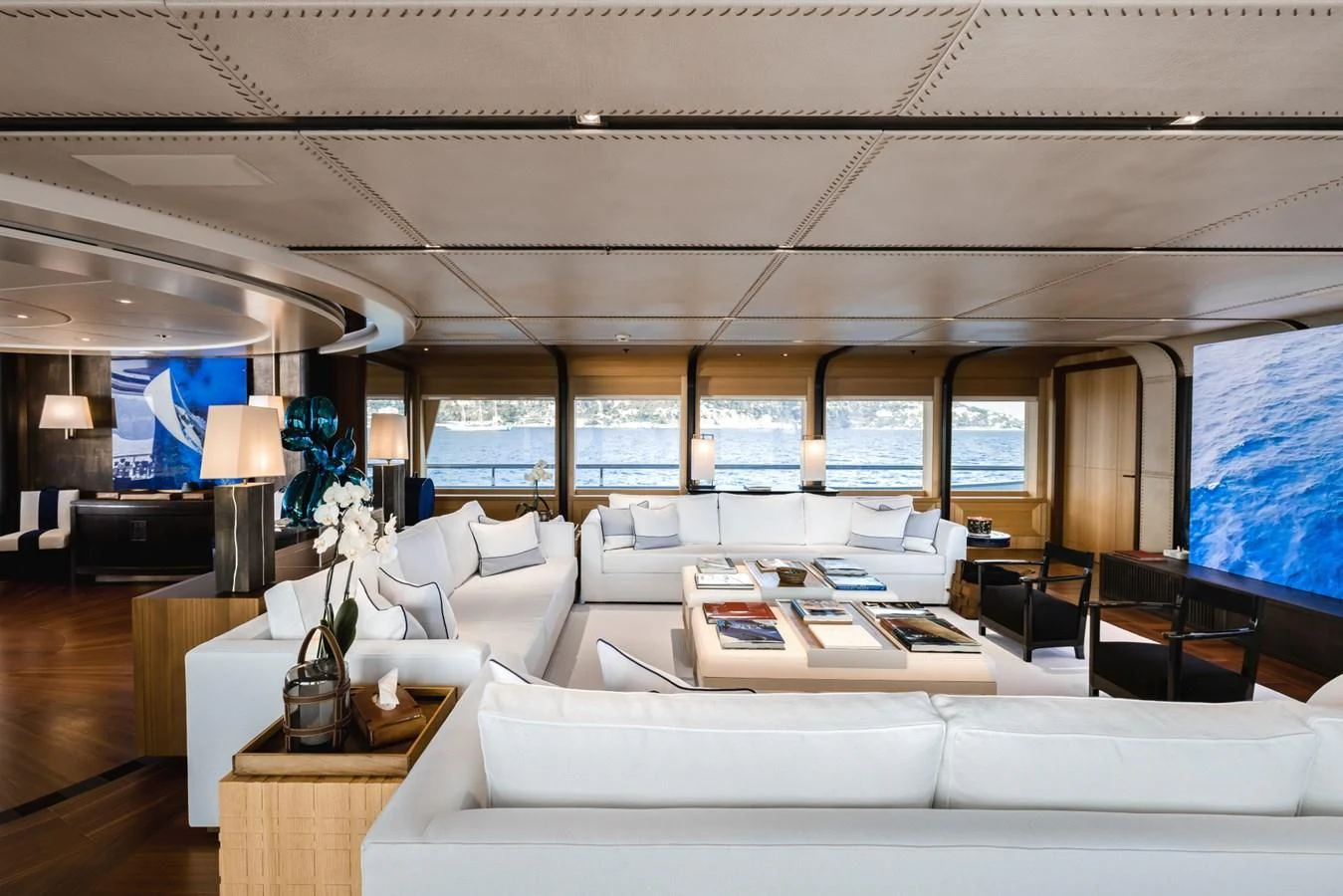 a room with couches and a table aboard VENTUM MARIS Yacht for Charter
