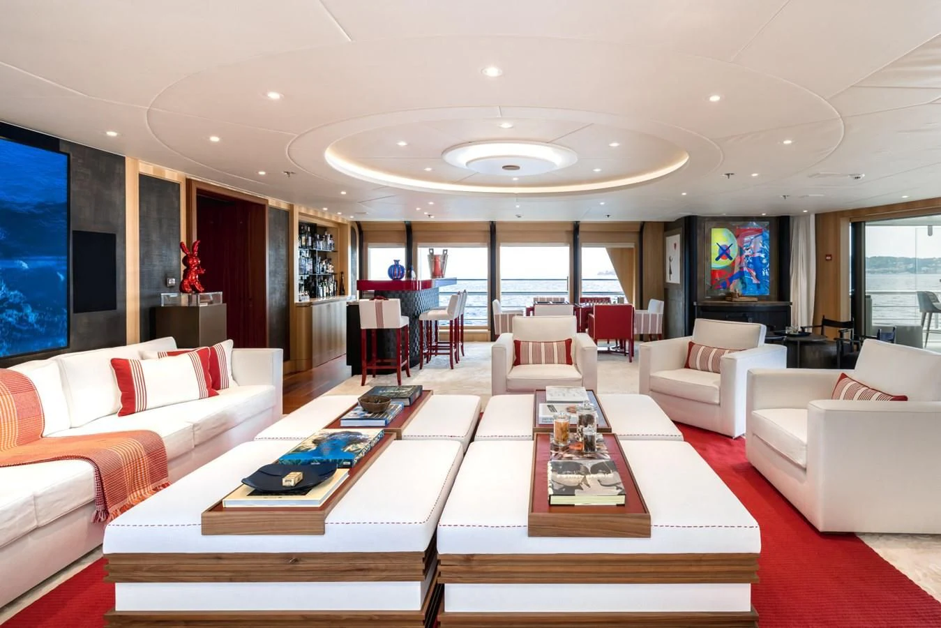 a living room with a large screen aboard VENTUM MARIS Yacht for Charter