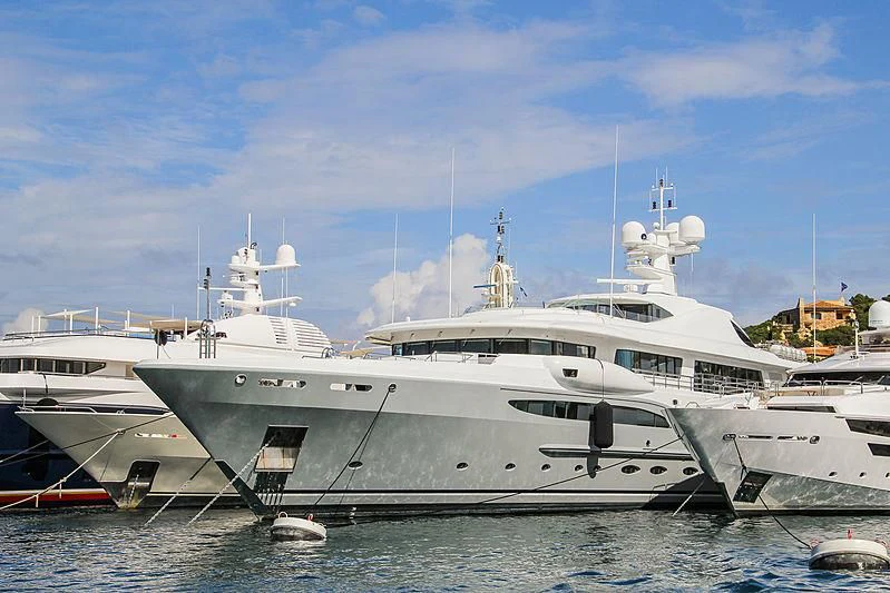 a couple of large white yachts aboard VENTUM MARIS Yacht for Charter