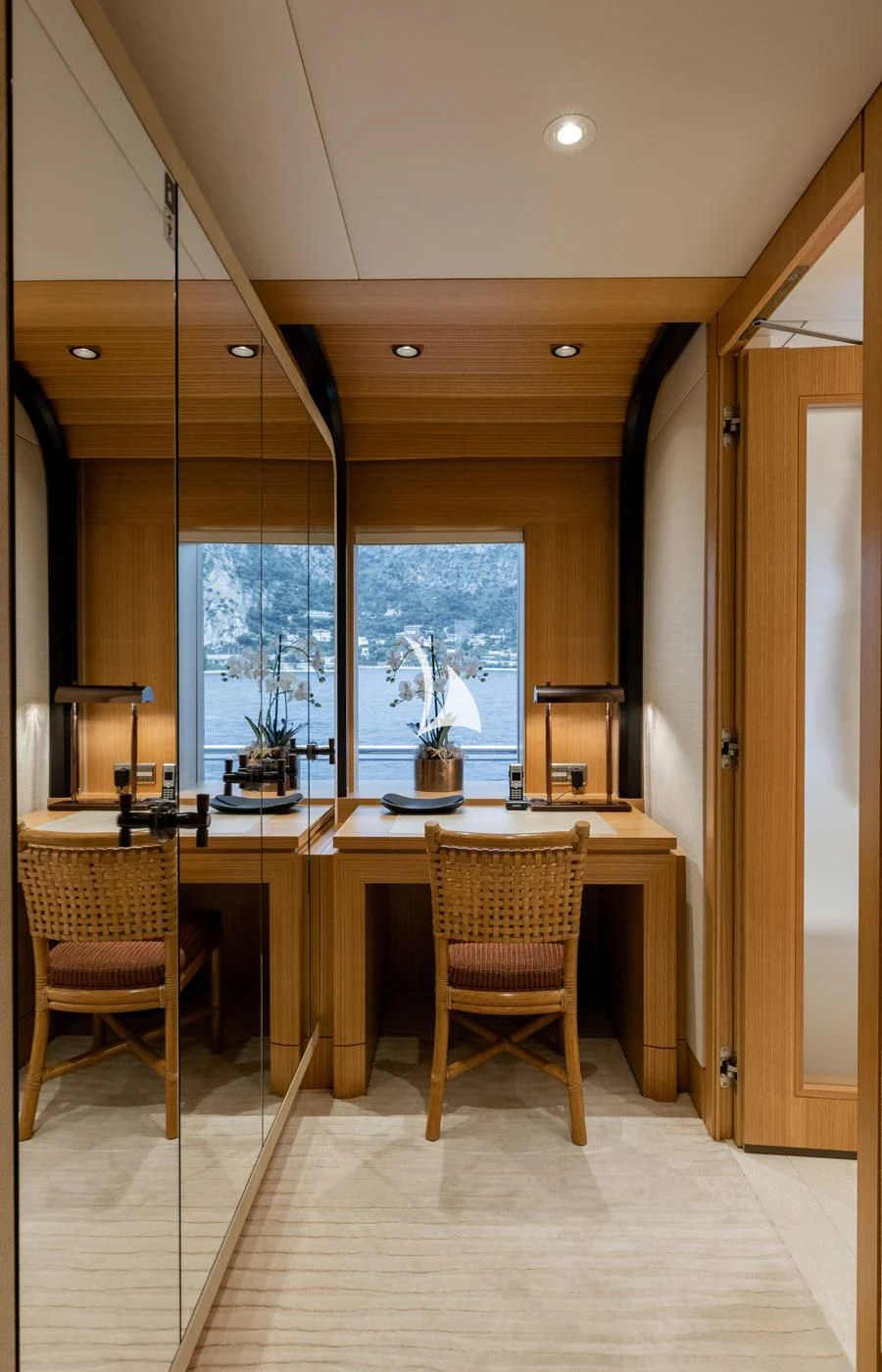 a kitchen with a table and chairs aboard VENTUM MARIS Yacht for Charter
