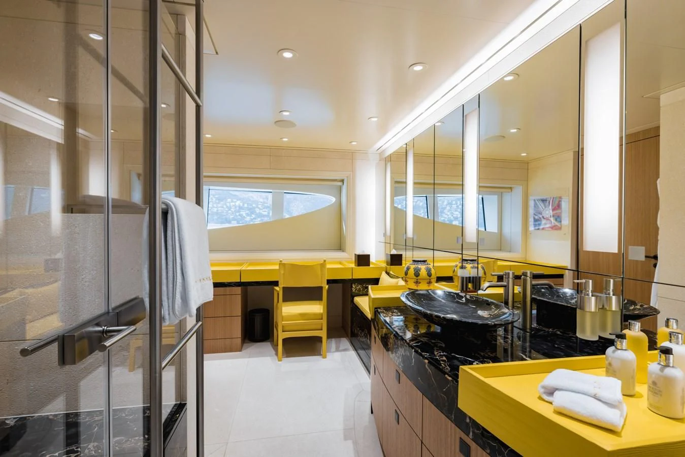 a kitchen with a large glass shower aboard VENTUM MARIS Yacht for Charter