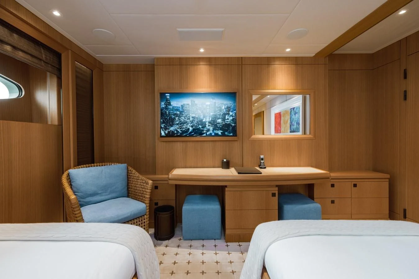 a room with a bed and a tv aboard VENTUM MARIS Yacht for Charter