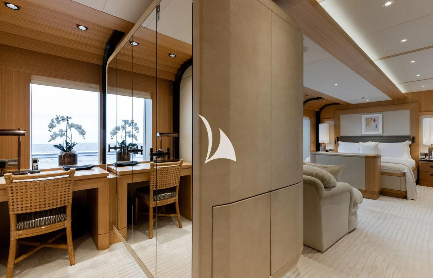 a room with a table chairs and a couch aboard VENTUM MARIS Yacht for Charter