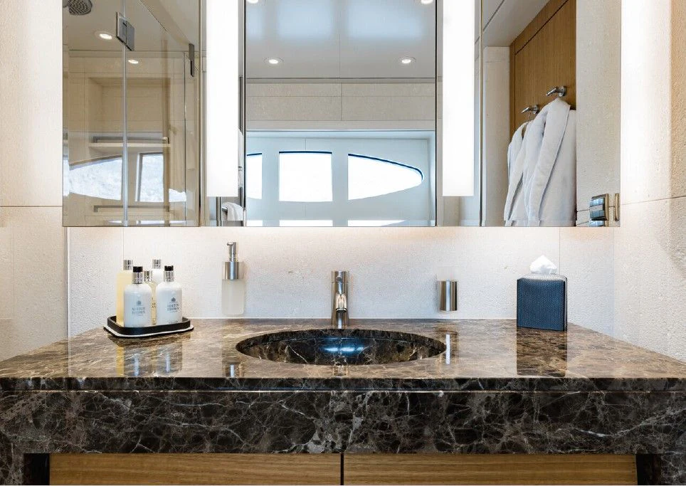 a bathroom with a marble counter top aboard VENTUM MARIS Yacht for Charter