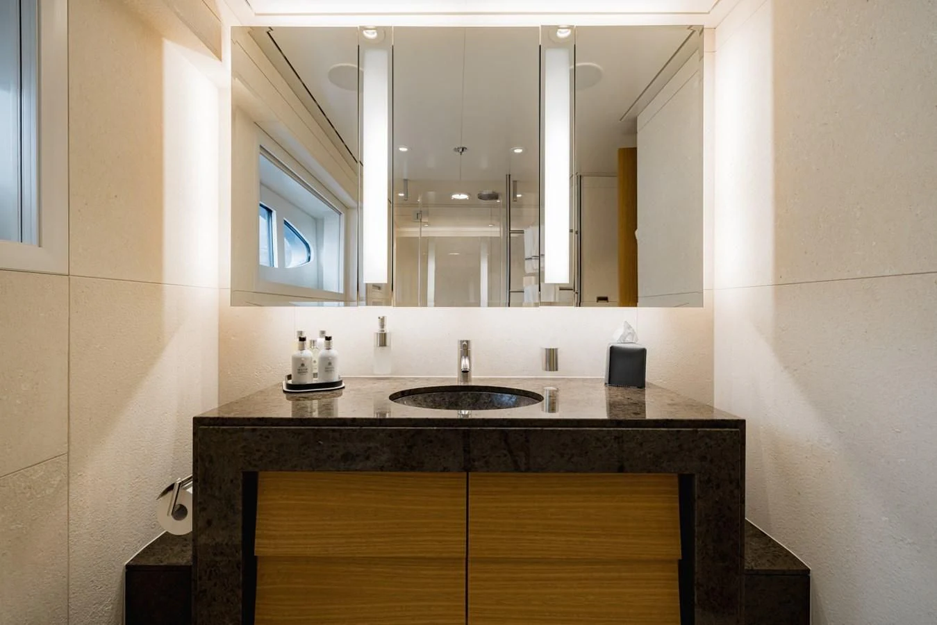 a bathroom with a large mirror aboard VENTUM MARIS Yacht for Charter