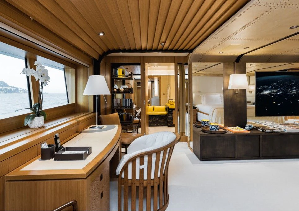 a room with a desk and a chair aboard VENTUM MARIS Yacht for Charter
