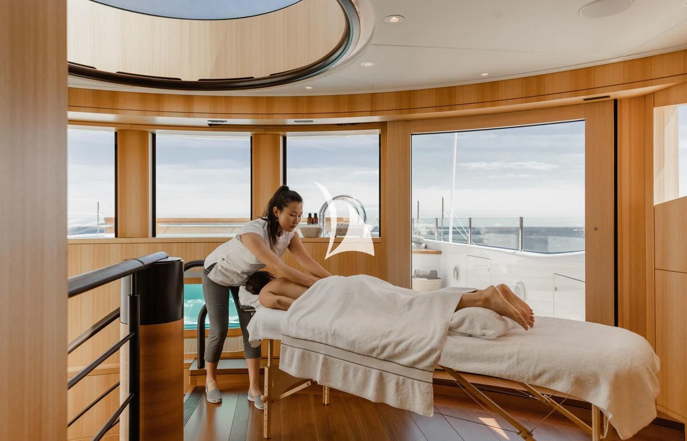 a person sitting on a bed aboard VENTUM MARIS Yacht for Charter