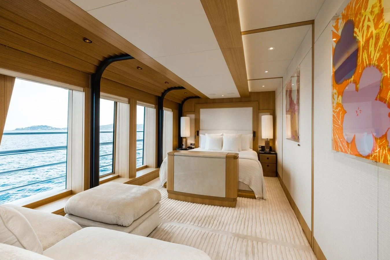 a room with a bed and a window aboard VENTUM MARIS Yacht for Charter