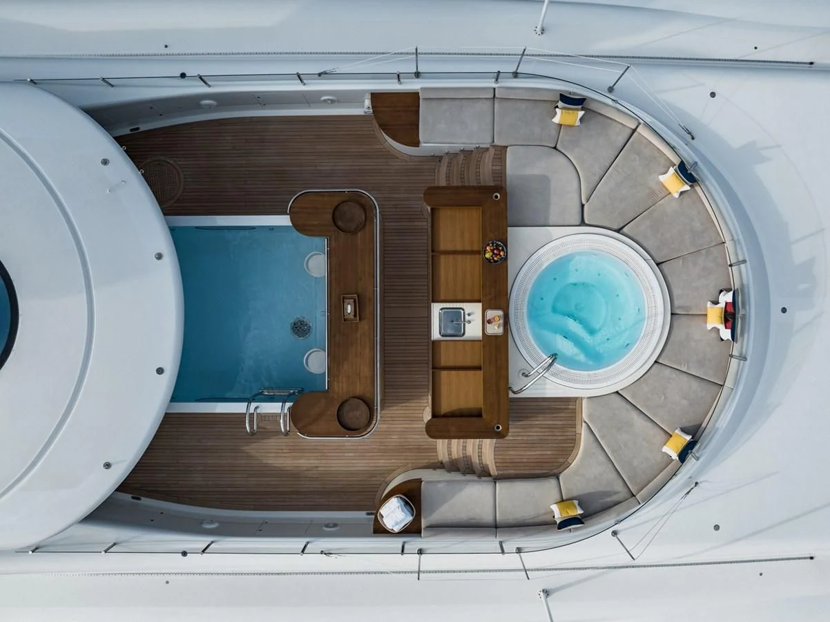 a group of speakers in a room aboard VENTUM MARIS Yacht for Charter