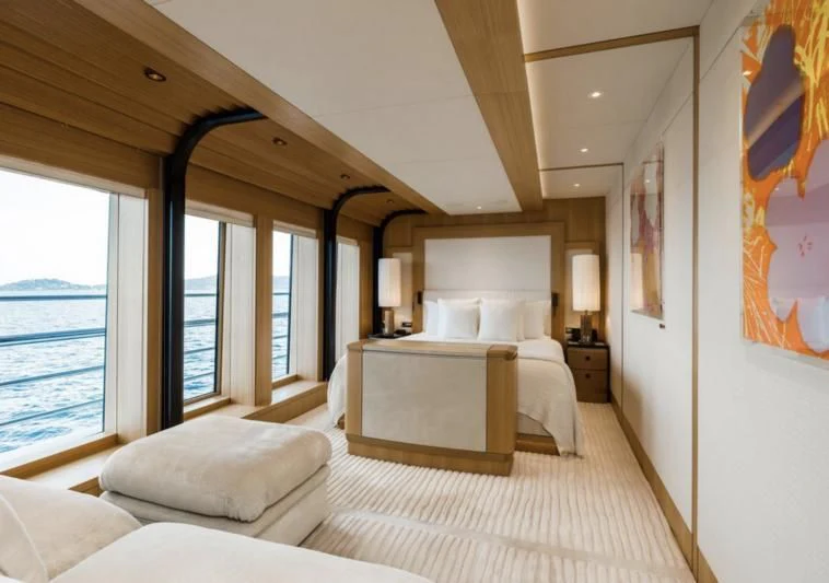 a bedroom with a large bed aboard VENTUM MARIS Yacht for Charter