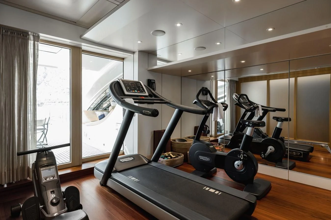 a gym with exercise equipment aboard VENTUM MARIS Yacht for Charter