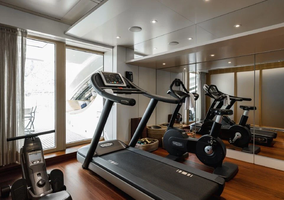 a gym with exercise equipment aboard VENTUM MARIS Yacht for Charter