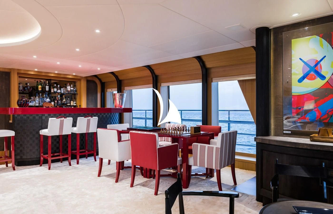 a room with tables and chairs aboard VENTUM MARIS Yacht for Charter